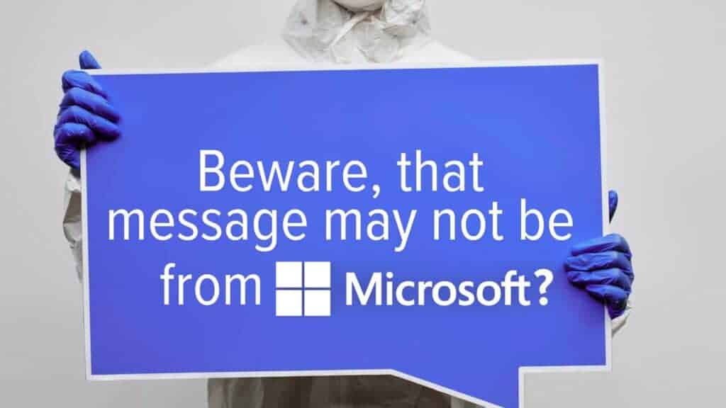 Person Holding a Blank Blue and White Signage. Image text: Beware, that message may not be from Microsoft