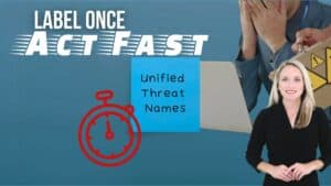 Header text: Label Once, Act Fast. Man with laptop and hands covering face in mid-ground. Sticky note with text: Unified threat names. Female Spokes person in foreground