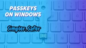 Keyboard with USB stick that looks like a door key. Image text: Passkeys on Windows: Simpler, Safer